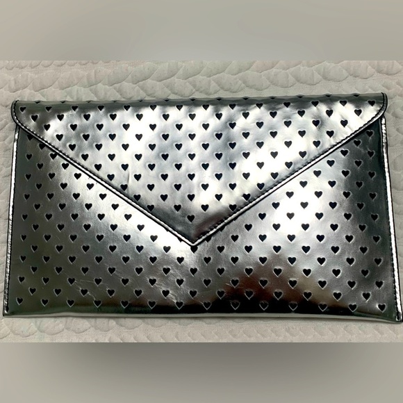 Adorable envelope style clutch handbag from JCrew
Silver metallic color - Picture 1 of 8